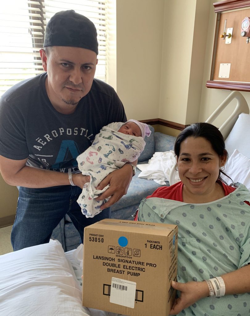 New family receiving a new breast pump.
